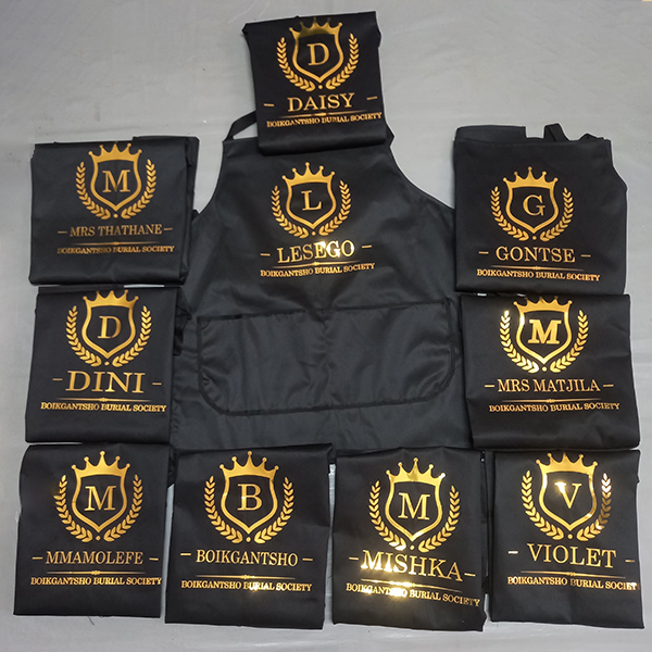 Product: Black Personalised Aprons as Custom Social Uniform for Events and Parties