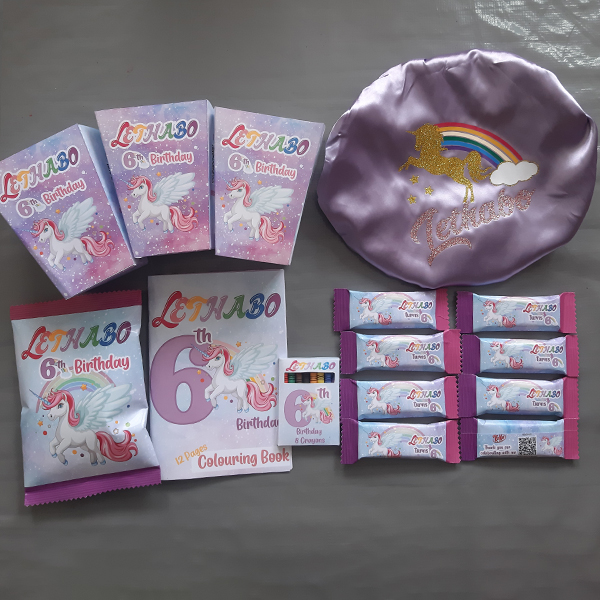 Product: Unicorn 5 x party pack set with a bonnets, chip bags, chocolates and colouring books