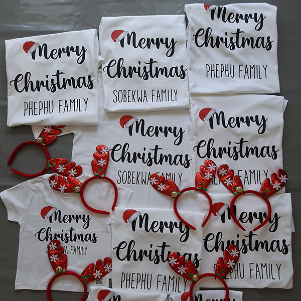 Product: Merry Christmas with a family name personalised christmas tshirt