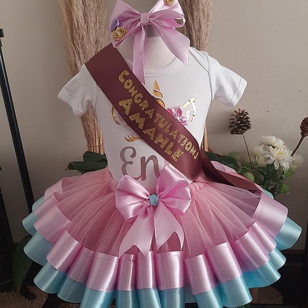 Product: Unicorn flowery ribbon tutu with personalised onesie with a matching headband 