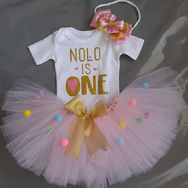 Product: Pom pom tutu with baby is one personalised top and headband