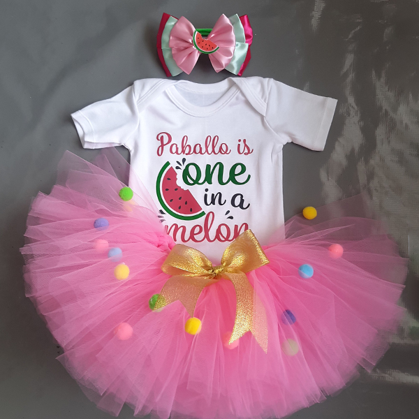 Product: Bright pink one in a melon pom pom tutu with personalised top and headband