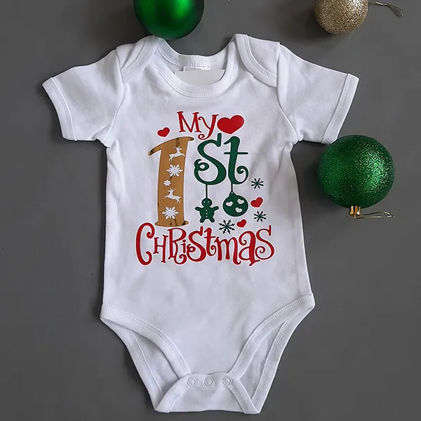 My first christmas onesie with gold 1 and reindeers